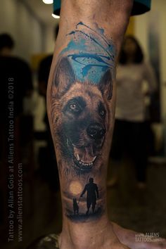 a man's leg with a dog tattoo on it and an image of a bear