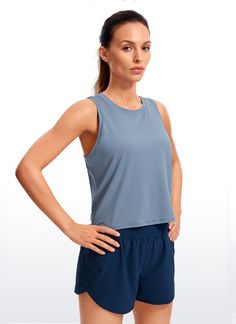 Ultra-lightweight and soft fabric with good breathability to keep you cool, and ultra-fine brushed feel for a comfortable and skin-friendly experience. High neck sport tank top with oversized armholes allows you to move freely without restraint. Great for running, exercise and other intense sports. Feature & Fitting: 
 Design for running, exercise 
 Cropped length, loose-fitting 
 Oversized armholes and high neck 
 Fabric: 
 Soft and lightweight fabric 
 Ultra-fine brushed feel 
 Four-way st Blue Sleeveless Activewear With Seamless Construction, Solid Sleeveless Tank Top For Workout, Stretch Sleeveless Muscle Tee For Workout, Summer Sports Tank Top With 4-way Stretch, Blue Breathable Athleisure Tank Top, 4-way Stretch Tank Top With Mesh Back For Training, Solid Sleeveless Tank Top For Gym, Sleeveless Tank Top For Gym, 4-way Stretch Sleeveless Activewear For Workout