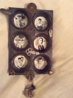 an old photo in a box with keychains attached to the sides and pictures on the inside