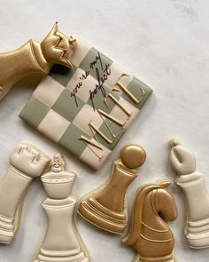 chess pieces are shown on a white surface