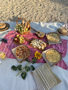 a picnic blanket with food on it