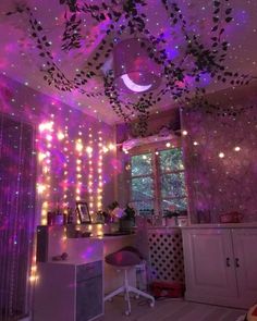 a room with lights and decorations on the ceiling