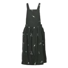 a black dress with white flowers on it