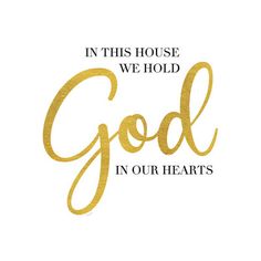 the words in this house we hold god in our hearts are gold foil on white paper