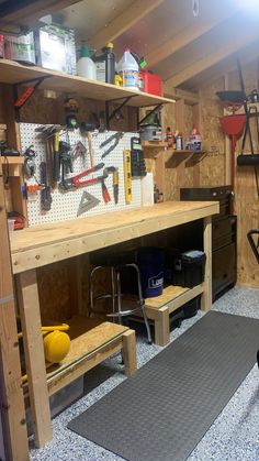 a workbench with tools on it in a garage