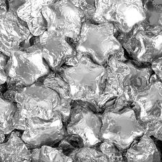 some silver foil is piled on top of each other