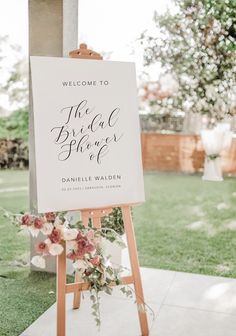 a welcome sign for the bride and groom at their outdoor wedding in san diego, california