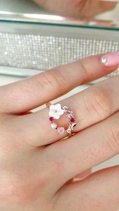 A sweet pearl, a gorgeous hibiscus resin flower, and a lovely rose gold butterfly that sits delicately in a circular shape. >> Butterfly Pink Multi-Stone Rose Gold Ring: https://pinealvisionjewelry.com/products/butterfly-pink-multi-stone-rose-gold-ring Delicate Pink Flower Ring As Gift, Delicate Pink Flower Ring Gift, Delicate Pink Flower Ring For Gift, Pink Flower Promise Ring, Dainty Pink Flower Ring, Delicate Pink Flower Ring For Wedding, Elegant Pink Flower Ring As A Gift, Anniversary Pink Flower Shaped Ring, Delicate Pink Open Ring Jewelry