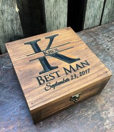 a wooden box with the words best man engraved on it