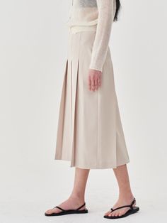 Composition : Exterior polyester 100 Lining polyester 100Country of Origin : KOREA Elegant Neutral Skirt For Spring, Beige Pleated Midi Skirt For Spring, Beige Formal Midi Bottoms, Formal Beige Midi Length Bottoms, Beige Accordion Pleated Bottoms For Spring, Beige Bottoms With Accordion Pleats For Spring, Spring Workwear Box Pleat Pleated Skirt, Spring Workwear Pleated Skirt With Box Pleat, Pleated Skirt With Pleated Back For Spring Workwear