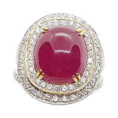 Cabochon Ruby 7.76 carats with Diamond 2.17 carats Ring set in 18 Karat White Gold Settings Width: 1.5 cm Length: 2.0 cm Ring Size: 53 Total Weight: 13.78 grams "We first opened doors in 1980 when it was then situated in the vicinity of the Victory Monument; a small and modest storefront with a couple of counters. From its humble beginnings to where it stands today, our company has proven its abilities as a jeweler. Since the beginning, we have been supplying fine quality pieces to dealers, whol Luxury Diamond Cabochon Gemstones, Luxury Diamond Gemstones With Cabochon Cut, Luxury Ruby And Diamond Oval Cabochon Ring, Luxury Oval Cabochon Diamond Gemstones, Luxury Ruby Ring With Oval Cabochon Diamond, Luxury Ruby Cabochon Diamond Ring, Formal Fine Jewelry Cabochon Gemstones, Fine Jewelry Cabochon Gemstones For Formal Occasions, Formal Hallmarked Diamond Cabochons