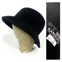 80s black wool hat by Kangol, design called Modeleine. So British and timeless.  Can be worn up and down. Soft shape. Quite deep (circa 11cm) Brim with few rows of stitching. No Kangol logo externally. Nice condition. SIZE: Regular M Brim: 7cm Internally: 55cm Retro Wide Brim Cloche Hat For Winter, Vintage Wool Cloche Hat With Short Brim, Vintage Wool Brimmed Cloche Hat, Wool Vintage Brimmed Cloche Hat, Classic Felt Bucket Hat For Winter, Classic Winter Felt Bucket Hat, Vintage Winter Brimmed Cloche Hat, Vintage Wool Cloche Hat With Curved Brim, Vintage Brimmed Cloche Hat For Winter