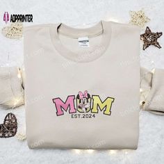 Introducing our Mom Est 2024 Minnie Embroidered Shirt, a delightful tribute to motherhood! Handcrafted with love, this shirt features a Disney Mom Shirt, Disney Mom, Shirt Embroidery, Proud Mom, Best Mother, Mickey Ears, Embroidered Hoodie, Embroidered Tshirt, Heartfelt Gifts