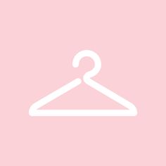 a white hanger on a pink background