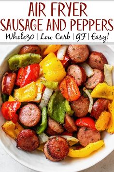 an air fryer sausage and peppers in a white bowl with the title above it