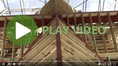 the video is showing how to build a house with wooden framing and trussing on it