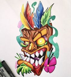 a drawing of a tiki mask with colorful feathers and flowers on it's face