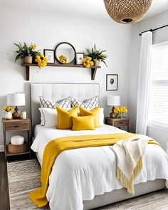 a bedroom with yellow and white decor