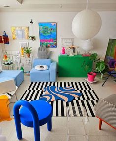 a living room filled with lots of colorful furniture