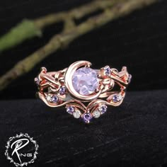 Unique lavender amethyst engagement ring sets Art deco rose gold promise ring Nature inspired moon leaf bridal sets Handmade jewelry gifts ring information: <-> Center stone: 6 mm round cut lavender amethyst <-> Side stone: 0.04ctw amethyst <-> - Band Thickness: 1.3 mm, Band Width: 2.5 mm Band information: <-> stone: 0.178ctw Amethyst + Moissanite <-> - Band Thickness: 1.2 mm, Band Width: 1.4 mm Metal: 925 silver, 10K 14K or 18k solid white gold, yellow gold, rose gold (please use the drop down Two Part Engagement Ring, Purple And Gold Engagement Ring, Gold And Amethyst Ring, Purple Wedding Rings Set, Fairy Core Rings, Amethyst Diamond Ring, Fairytale Engagement Rings Gold, Pretty Engagement Rings Unique, Engagement Rings Fairy