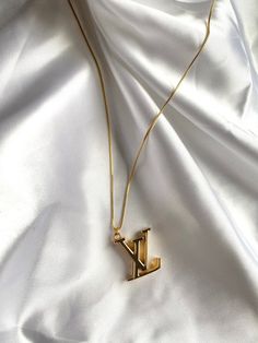 The Icon Necklace – Ahava J Luxury Pendant Charm Necklaces With Logo, Luxury Gold-plated Necklaces, Luxury Jewelry Pendant With Logo Charm, Luxury Classic Necklace With Charms, Luxury Pendant Necklace With Logo Charm, Luxury Vintage Necklace With Logo Charm, Luxury Trendy Chain Necklace For Everyday, Luxury Necklace With Polished Finish As Gift, Luxury White Gold Plated Charm Necklaces