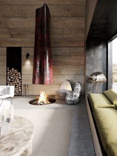 a living room filled with furniture next to a fire place on top of a rug