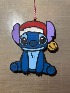 a christmas ornament shaped like a cartoon character