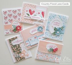 a bunch of cards that are sitting on top of each other with the words country floral lane card kit by mail