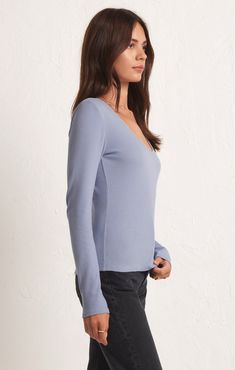 It's all sleek lines and elevated feels with the Sirena Rib Long Sleeve Tee. This perfect fitted layering piece can be worn with anything, tucked or untucked.