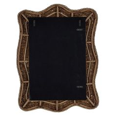 an ornate wooden frame with a blackboard in the middle and wicker trim around it