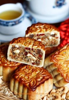 chinese desserts with nuts and tea on the side