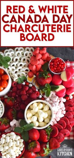 red and white canada day charcuterie board with strawberries, raspberries, cherries, mozzarella