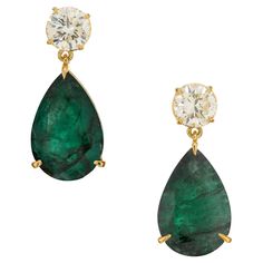 Spectacular emerald and diamond dangle earrings. 2 GIA pear shaped emeralds one weighing 8.04 carats and other one at 7.51cts, set in 18k yellow gold three prong settings. Both gemstones have a rich green color, one stone has minor clarity enhancements and one has moderate clarity enhancement. Both stones are complimented with 2 GIA certified round brilliant cut diamonds that are well matched with great brilliance and warmth that brings out the 18k yellow gold of the settings. Designed and craft Luxury Pear-shaped Gemstone Jewelry, Gold Dangle Earrings, Diamond Dangle Earrings, Jade Earrings, Rich Green, Diamond Gold, Jade Stone, Gold Earrings Dangle, Emerald Diamond