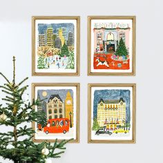 three framed pictures hang on the wall next to a christmas tree