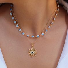 Elevate your style with our chic Traditional Evil Eye Necklace. Perfect protection necklace as a gift for her or the holidays! 🌺Measurements:- White Evil Eye Chain is 16ʺ (+ 2ʺ extender)- Ball Chain is 16ʺ, 18ʺ, 20ʺ / Evil Eye Sun Charm is 24mm- FULL SET includes 16ʺ Pendant Necklace & 16ʺ Evil Eye Chain. 🌺 Lets be Friends, Follow usInsta: @theviewsandco White Evil Eye, Necklaces Choker, Sun Charm, Jewel Necklace, Protection Necklace, Evil Eye Pendant, Luck Charms, Evil Eye Necklace, Eye Necklace