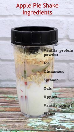 an apple pie shake ingredients in a blender on a table with text overlay