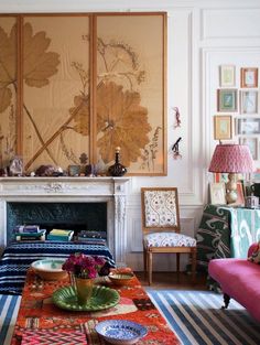 a living room filled with lots of colorful furniture