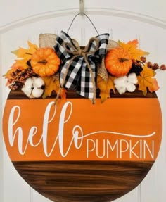 a wooden sign that says hello pumpkin on it