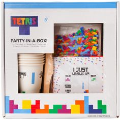 tetris party - in - a - box is packed with legos and cups