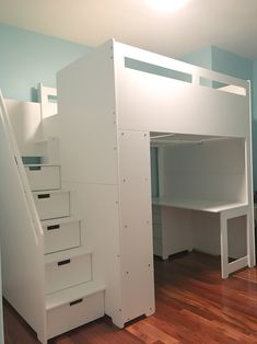 there is a loft bed with stairs in the room and drawers under it on the floor