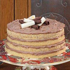 a cake with chocolate frosting on a plate