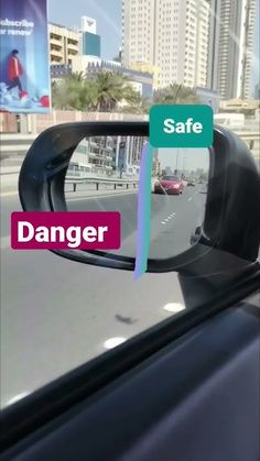 a side view mirror with the words safe and danger on it