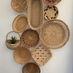 wicker baskets are arranged on the wall