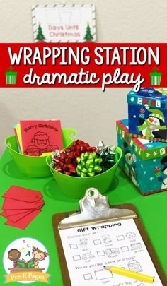 a green table topped with lots of boxes and wrapping paper next to a sign that says wrapping station dramatic play