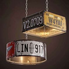 two hanging lights with license plates on them