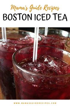 two glasses filled with iced tea sitting on top of a wooden table next to each other