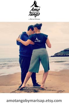 two people embracing on the beach with text overlay that reads, amotan go by marsap esty com