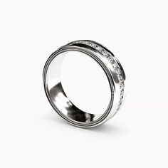 a white gold wedding ring with diamonds on the inside and outside, set in 18k white gold