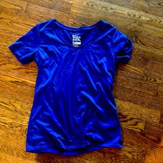 Cobolt Blue Nike Shirt Like New Never Worn Blue Stretch V-neck T-shirt, Blue V-neck Athleisure Top, Blue Basic Tops With Moisture-wicking, Basic Blue Moisture-wicking Tops, Blue Cotton Workout T-shirt, Blue Cotton T-shirt For Workout, Basic Blue V-neck T-shirt, Blue Short Sleeve Workout Top, Blue Relaxed Fit Workout Tops