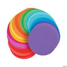 a stack of multicolored frisbees sitting on top of each other